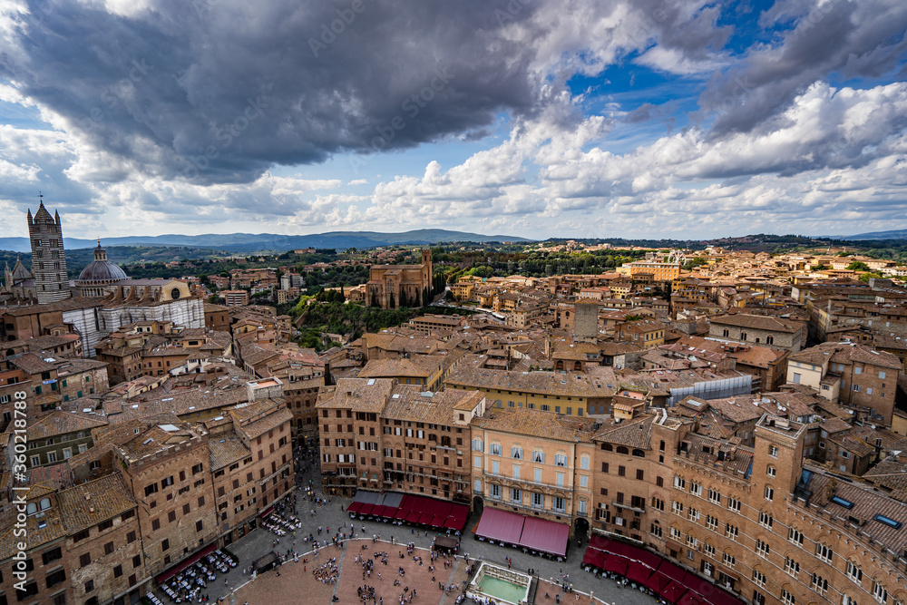 Siena, Italy panorama rooftop city view. Siena Cathedral and Mangia Tower