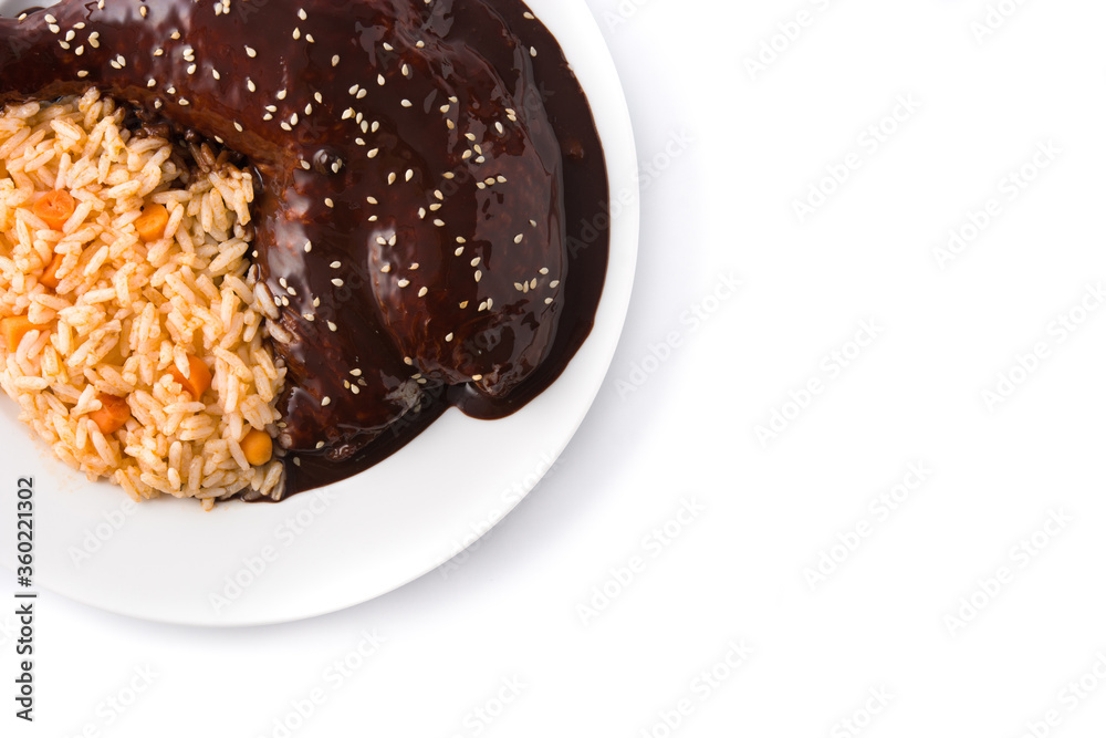 Traditional mole Poblano with rice in plate isolated on white background. Top view. Copy space Traditional mole Poblano with rice in plate isolated on white background. Top view. Copy space