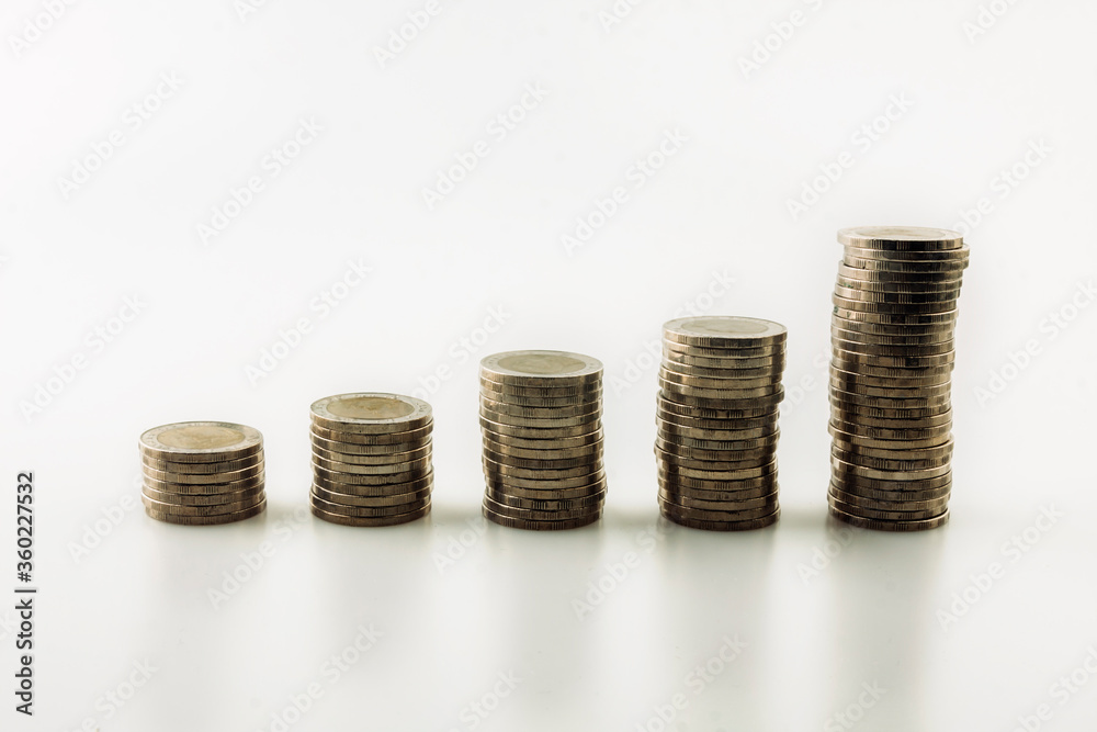 Coin in glass bottle with money stack step up growing growth saving money, Concept financial business investment, Copy space for your text Coin in glass bottle with money stack step up growing growth saving money, Concept financial business investment, Copy space for your text