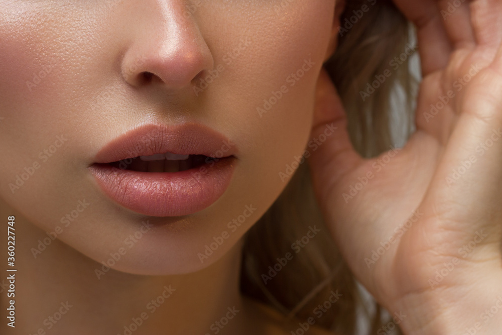 Fototapeta premium Perfect Lips. Sexy Girl Mouth close up. Beauty young woman Smile. Natural plump full Lip. Lips augmentation. Close up detail. Natural beauty
