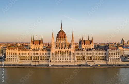 Aerial drone shot of Hungarian Parliament facade during Budapest sunset