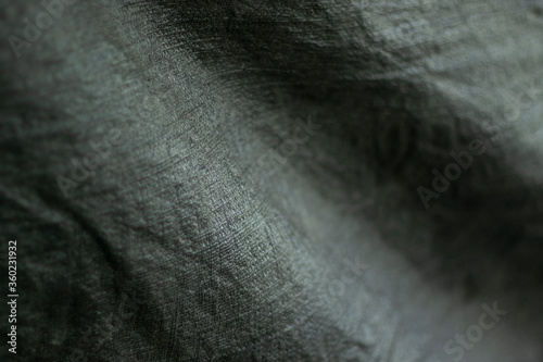 Cloth black and slightly jagged abstract background