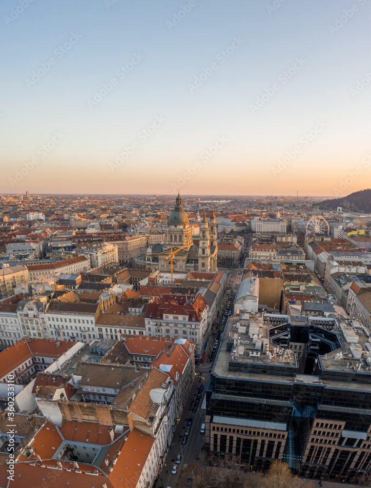 Aerial drone shot of St. Stephen Basilica during Budapest sunset hour in winter