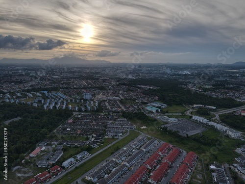 Kuching, Sarawak / Malaysia - June 25, 2020: The Samajaya Industrial Zone and the Tabuan Tranquility commercial area, condominium and residential houses photo