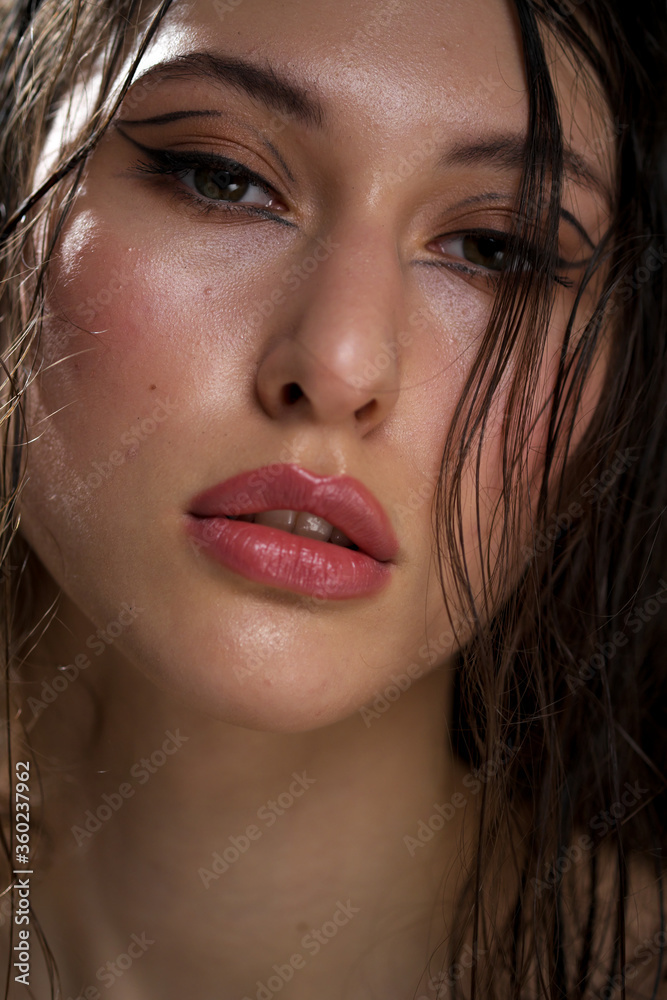 Black Cute Girls Naked - The face of a beautiful young girl with wet black hair close-up. Eastern  appearance. Nude makeup, natural skin. Stock Photo | Adobe Stock