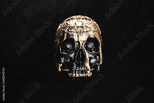 Canvas Print Top view of occult voodoo skull on black
