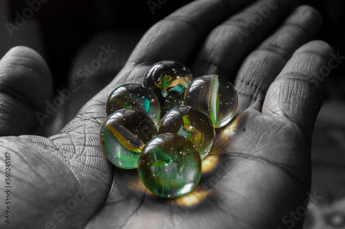 Glass balls in hand