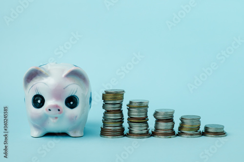 Saving piggy bank with step...