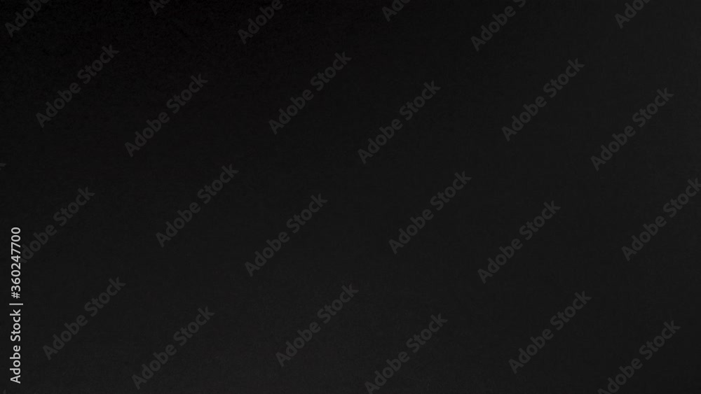 Stop Motion Animation_Green paper ball unwrapping on black background_Green screen Stop Motion Animation_Green paper ball unwrapping on black background_Green screen