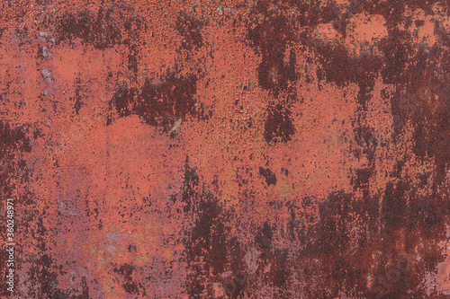 Abstract metal texture background. Old surface in rust and dirt in red color.