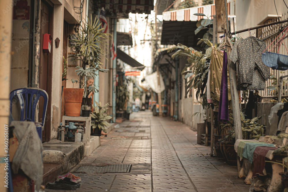 Empty deserted alleyways of Chinatown (Yaowarat Road) in Bangkok, Thailand during the lock down and home quarantine due to the covid-19 pandemic showing the new normal life Empty deserted alleyways of Chinatown (Yaowarat Road) in Bangkok, Thailand during the lock down and home quarantine due to the covid-19 pandemic showing the new normal life