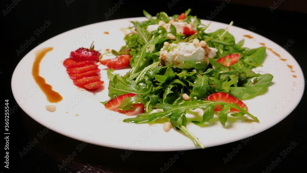 Salad with arugula, cream cheese and strawberries. Salad with arugula and strawberries. Rucola and strawberries. Salad with arugula, cream cheese and strawberries. Salad with arugula and strawberries. Rucola and strawberries.