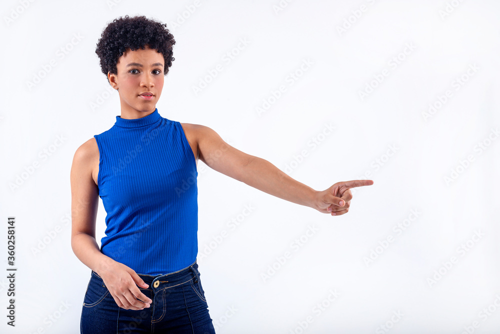 Young, elegant and smiling woman against white background. Portrait of a beautiful black model isolated on white background.
Young, elegant and smiling woman against white background. Portrait of a beautiful black model isolated on white background.