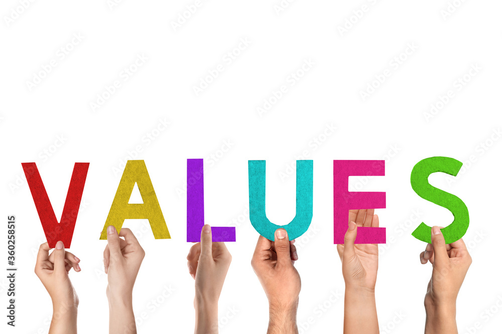 People making word VALUES of letters on white background People making word VALUES of letters on white background
