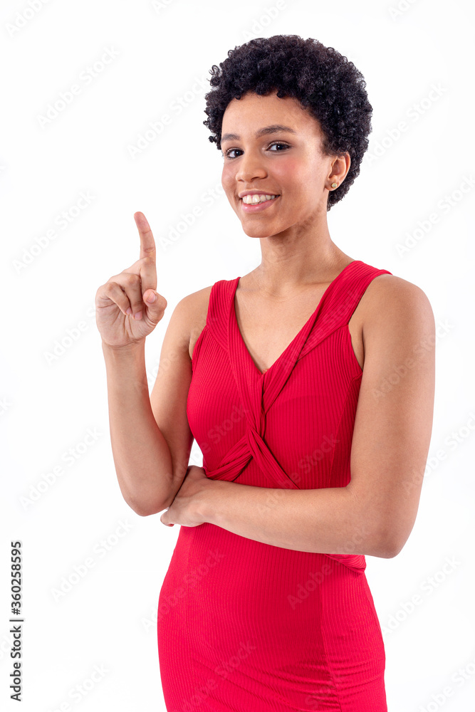 Young, elegant and smiling woman against white background. Portrait of a beautiful black model isolated on white background.
Young, elegant and smiling woman against white background. Portrait of a beautiful black model isolated on white background.