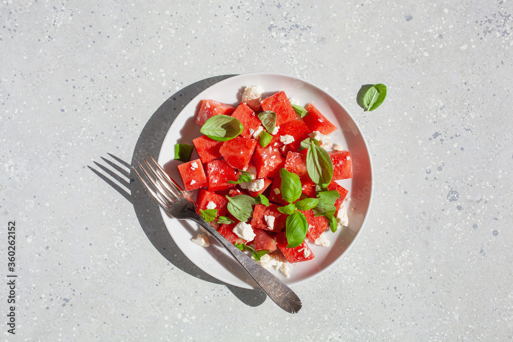 watermelon salad with feta cheese and basil. healthy summer dessert watermelon salad with feta cheese and basil. healthy summer dessert