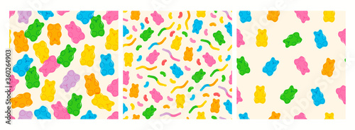 Colorful Fruity and tasty Sweets and Candies. Various Gummy and Jelly Worms, Beans, Bears. Hand drawn Vector Trendy illustration. Cartoon style. Set of three Seamless Patterns. Backgrounds, Wallpaper. photo