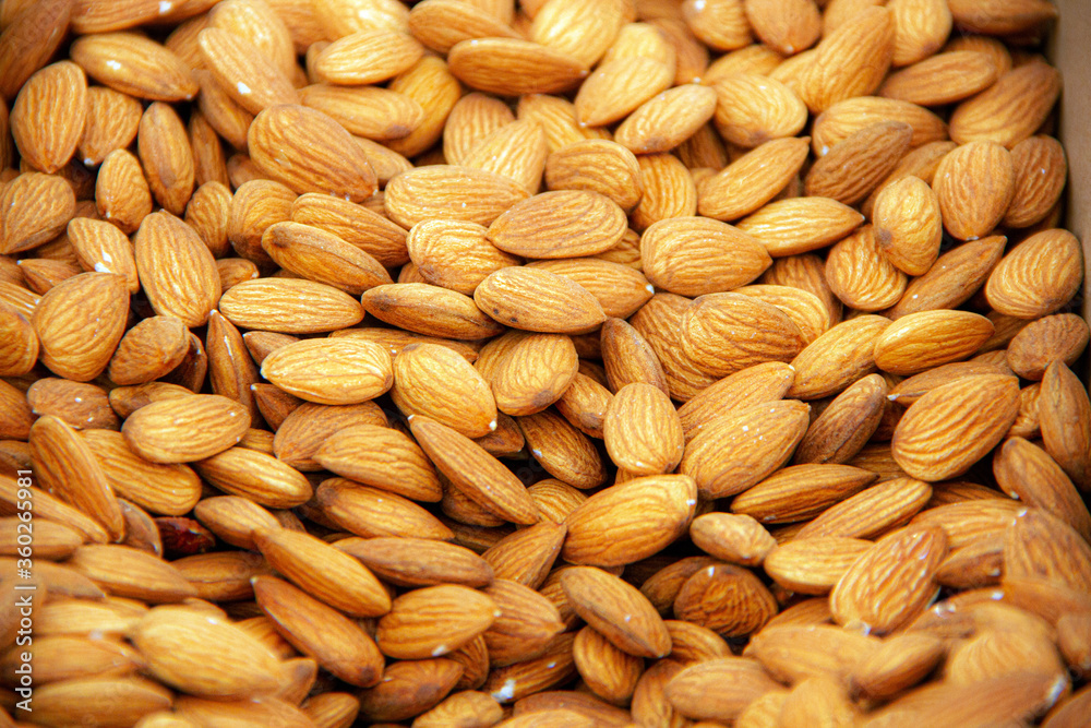 Dried almond seeds in the grocery stock Dried almond seeds in the grocery stock