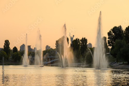 Cascade of high fountains on the Rusanovsky channel on the left bank of Kyiv