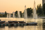 boats on the pier on the banks of the Rusanovsky canal in the light of the setting sun