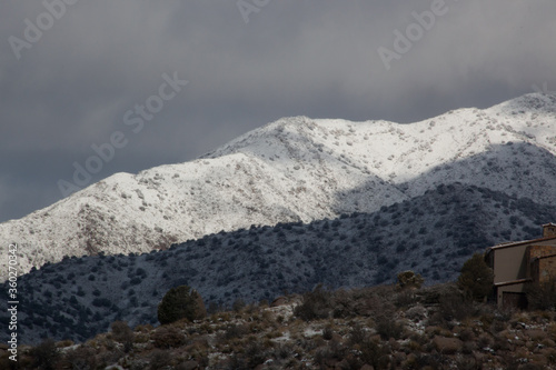 Winter mountain with clouds above