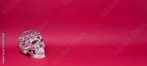 Fototapeta Naklejka Na Ścianę i Meble -  Day of the Dead, mexican skull isolated on red background