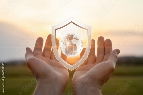 Concept of security and protecting the world from viruses and problems.