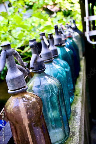 close up image of old glass soda bottle