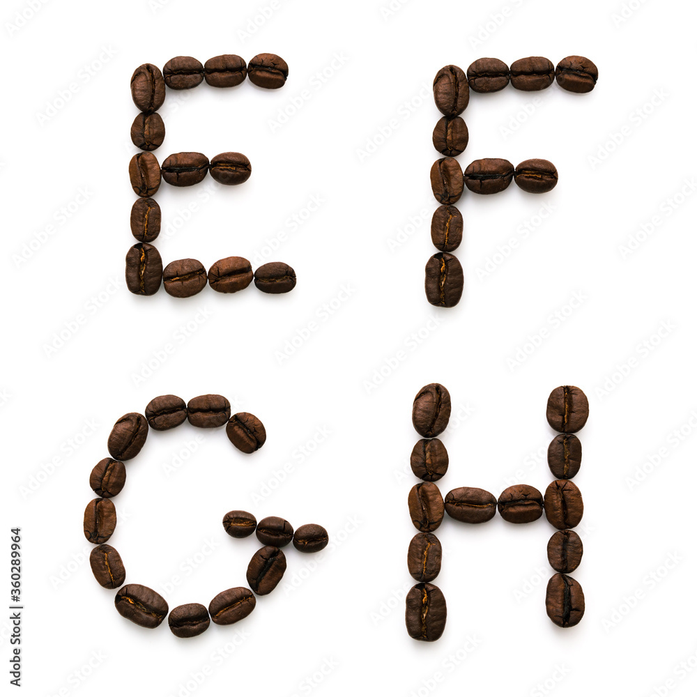 Alphabet made up of coffee beans. Isolated on a white Alphabet made up of coffee beans. Isolated on a white