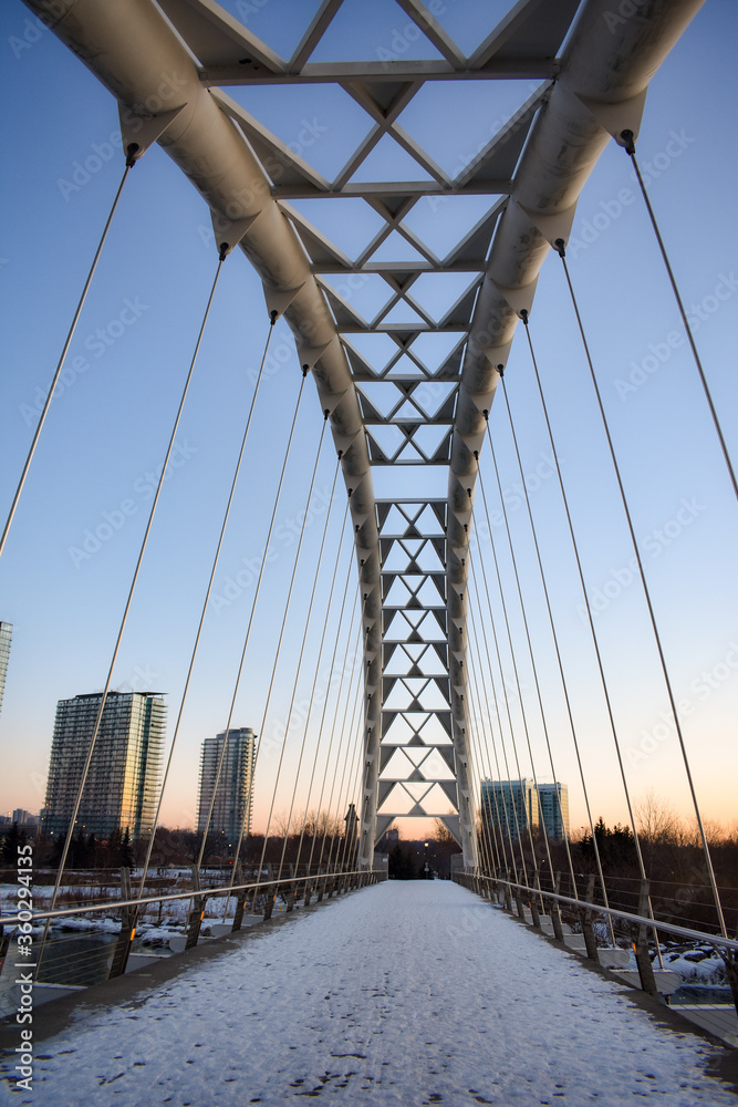 Naklejka premium Arch Bridge view in a frozen winter morning
