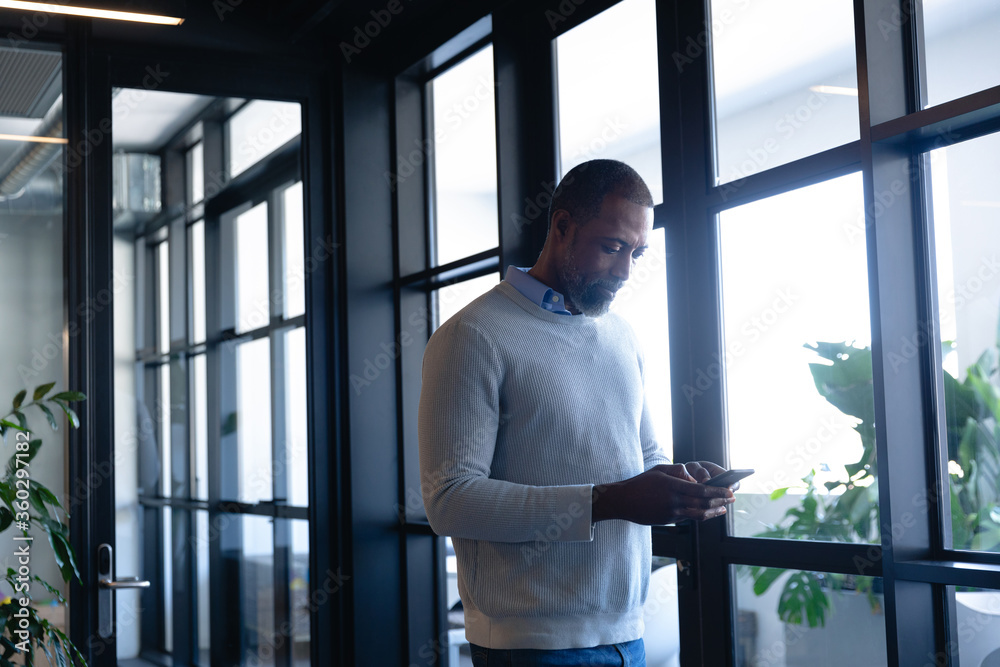 African American man using his phone African American man using his phone