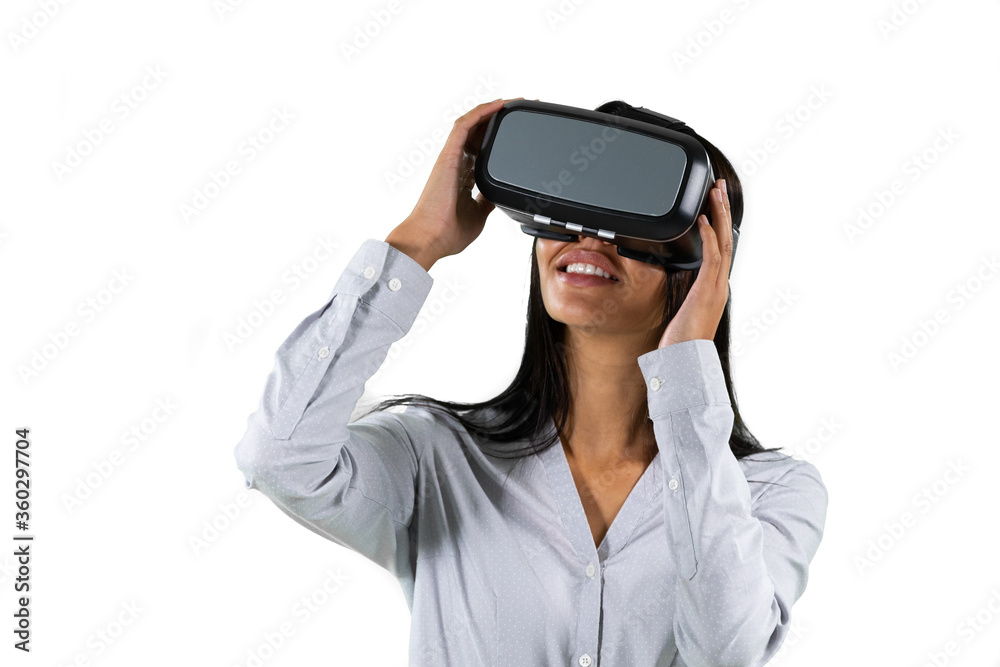 Mixed race business woman wearing a Virtual Reality headset Mixed race business woman wearing a Virtual Reality headset