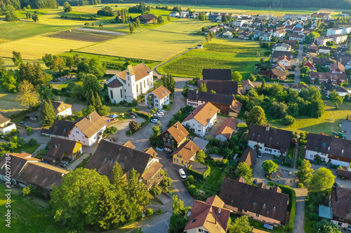 Airview on old church with village centre