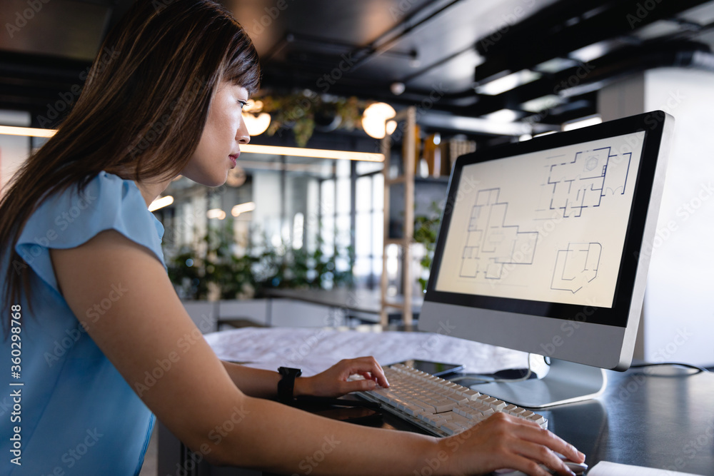 Asian architect woman working on computer Asian architect woman working on computer