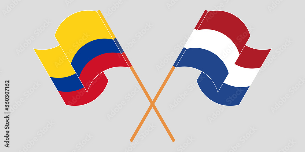 Crossed and waving flags of Colombia and the Netherlands Crossed and waving flags of Colombia and the Netherlands