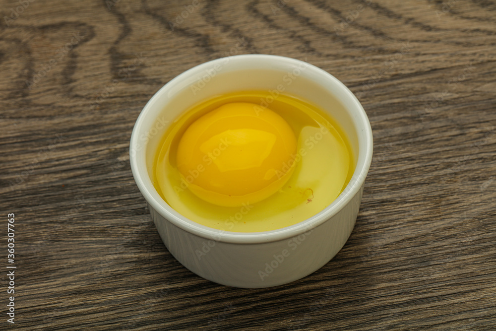 Raw Chicken egg in the bowl Raw Chicken egg in the bowl