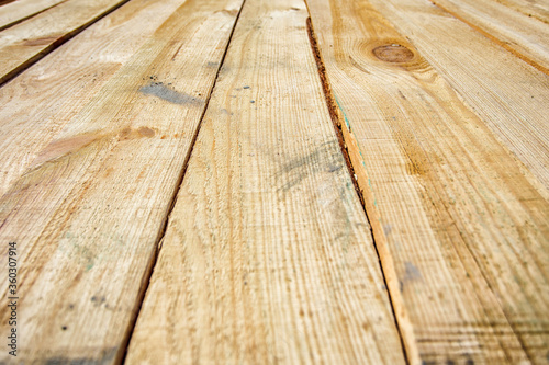 Wood air drying (seasoning lumber or wood seasoning). Timber. Lumber. Close-up. Wooden planks. Beams. Air-drying timber stack