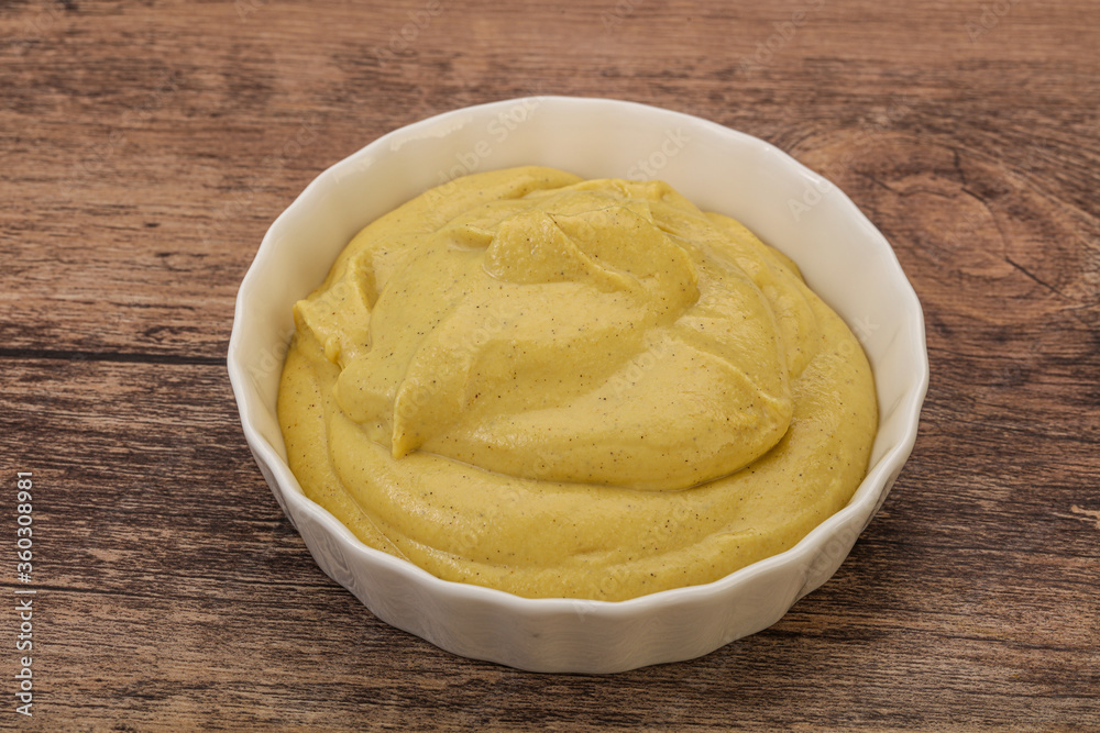 Dijon mustard sauce in the bowl Dijon mustard sauce in the bowl
