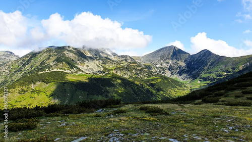 Fototapeta Naklejka Na Ścianę i Meble -  Romania, Retezat Mountains, Peleaga and Papusa Peaks, mountain landscape with blue sky