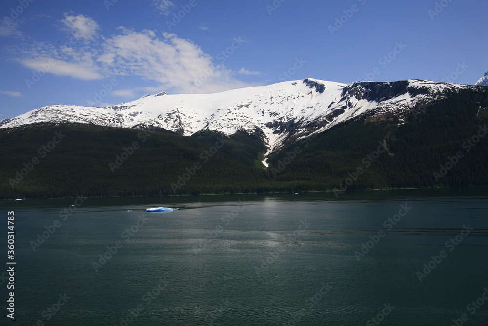 Snow covered mountain view from fjord
