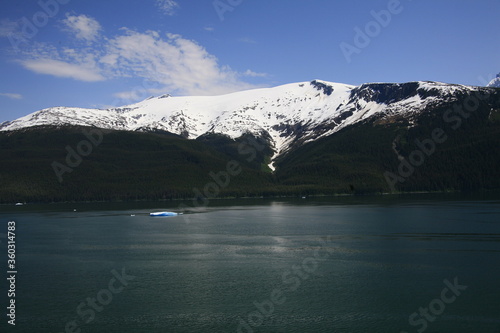 Snow covered mountain view from fjord