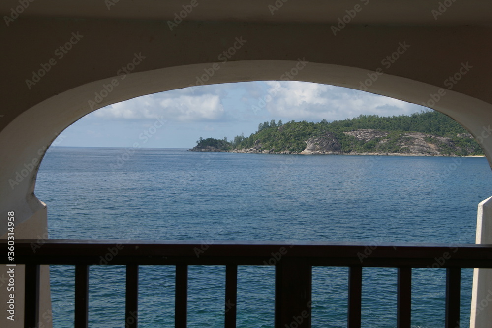 View of coastline framed by bridge