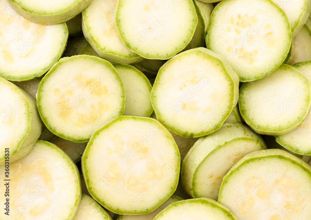 Sliced zucchini, background. The view from top Sliced zucchini, background. The view from top