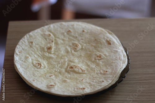 Empty tortillas on a plate. Selective focus.
