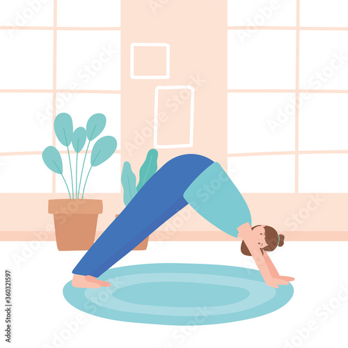 woman practicing yoga svanasana pose exercises, healthy lifestyle, physical and spiritual practice