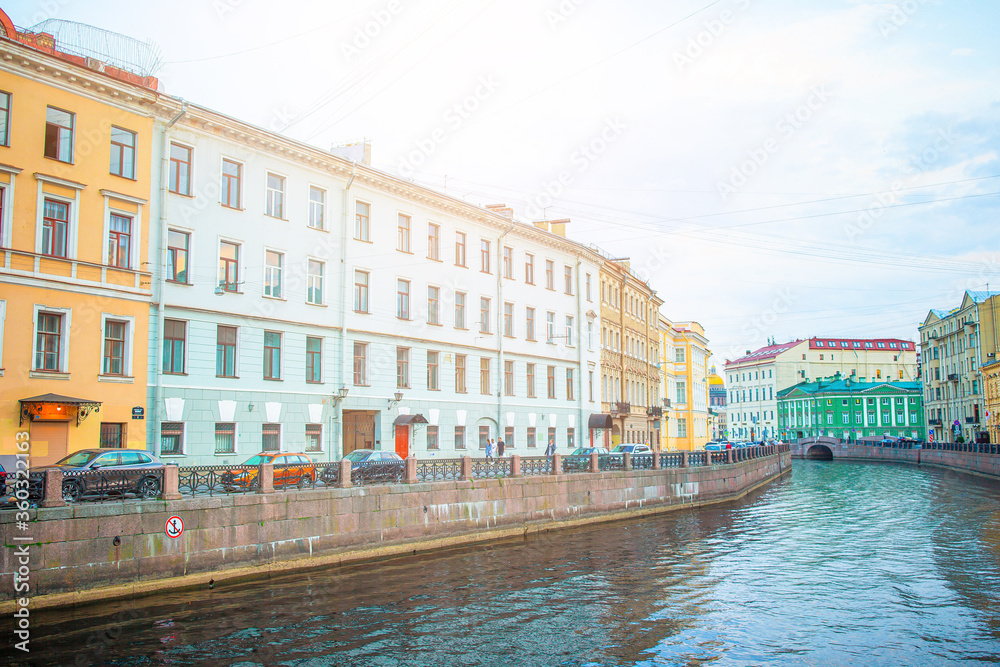 Ancient streets and embankment with the Neva River in the city of Saint Petersburg