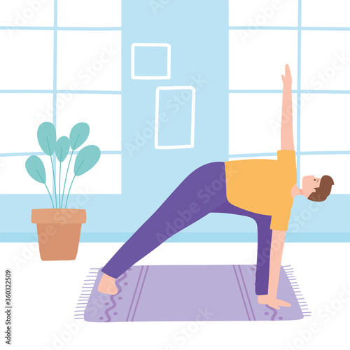 man practicing yoga trikonasana pose exercises, healthy lifestyle, physical and spiritual practice