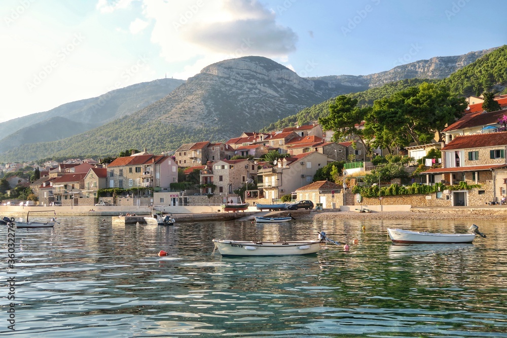 Bol seaside town on Brac island Croatia, with boats and water, mountains, Croatia, Europe, summer. 