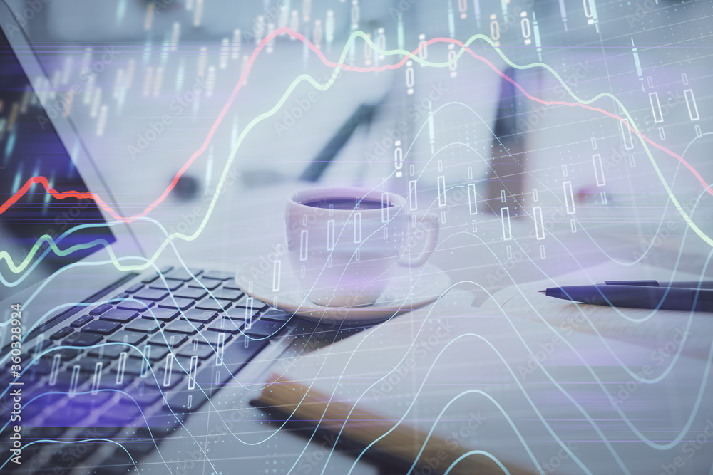 Double exposure of financial chart drawing and desktop with coffee and items on table background. Concept of forex market trading Double exposure of financial chart drawing and desktop with coffee and items on table background. Concept of forex market trading