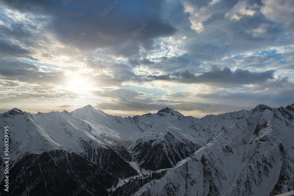 Obraz premium Panorama of alpine mountains in the morning at the Ischgl ski resort, Austria.
